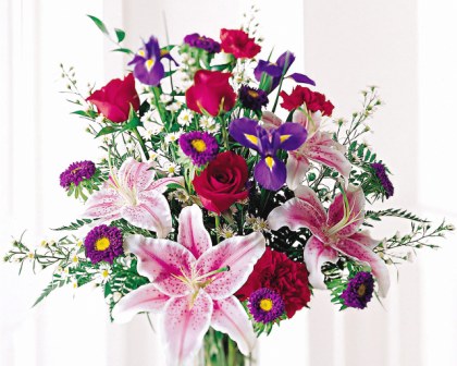 stunning-beauty-bouquet-roses-iris-stargazer-lilies-carnations-asters.jpg